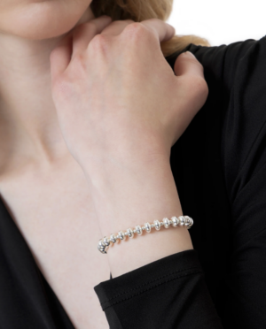 Bracciale Elastico Rondelle Bombate Nickel tested. Lega di zinco placcata in argento. 