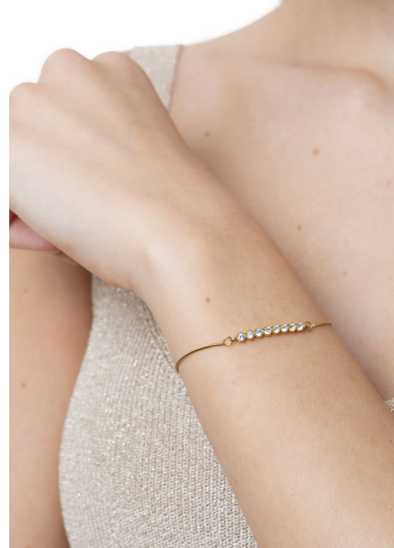 Bracciale donna regolabile con fila di zirconi, Nickel tested. Acciaio placcato oro