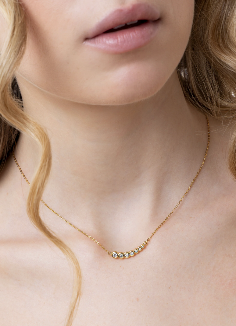 Collana punto luce donna con zirconi Acciaio inossidabile placcato oro.